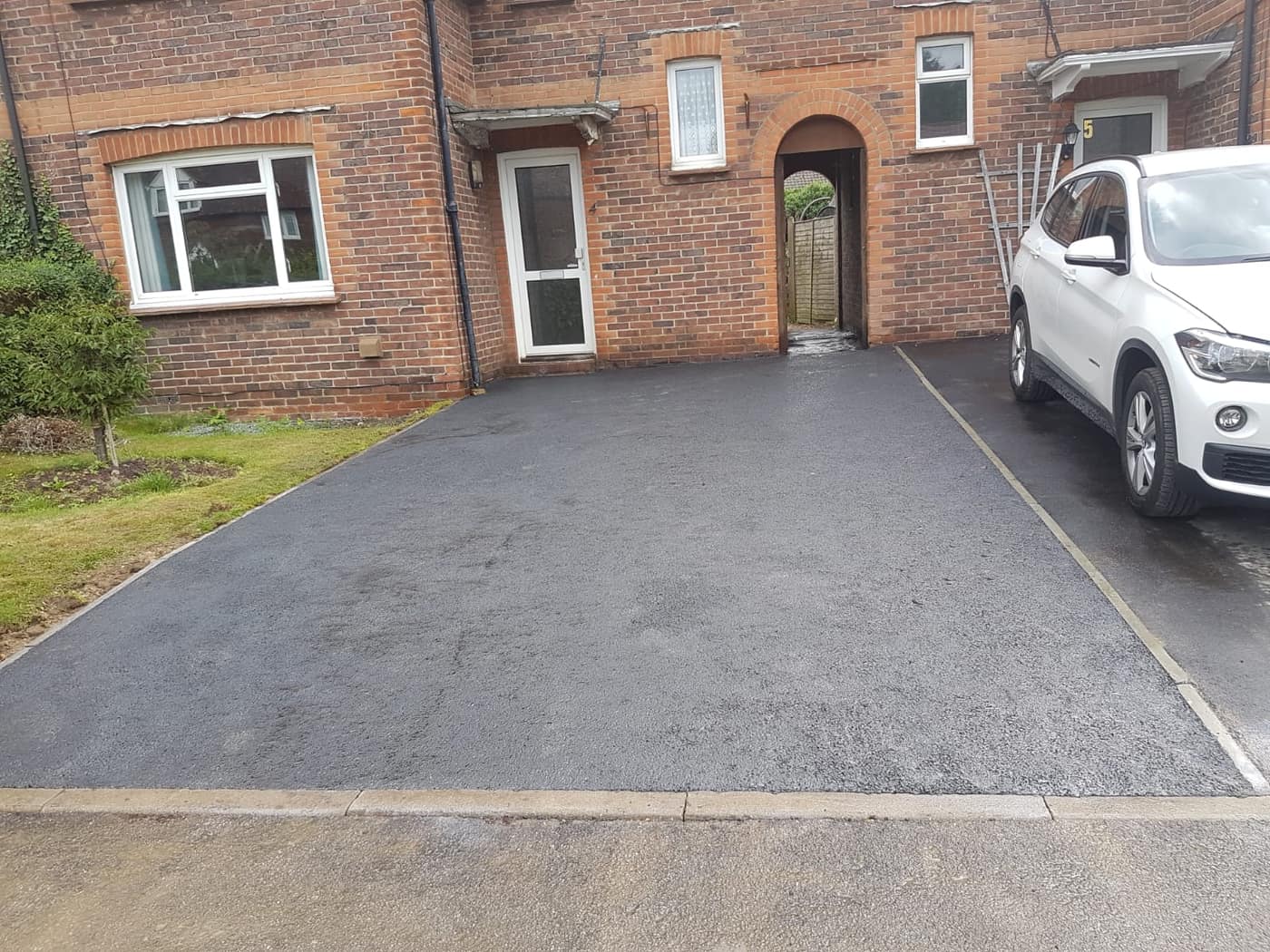 Tarmac driveway with block paving border