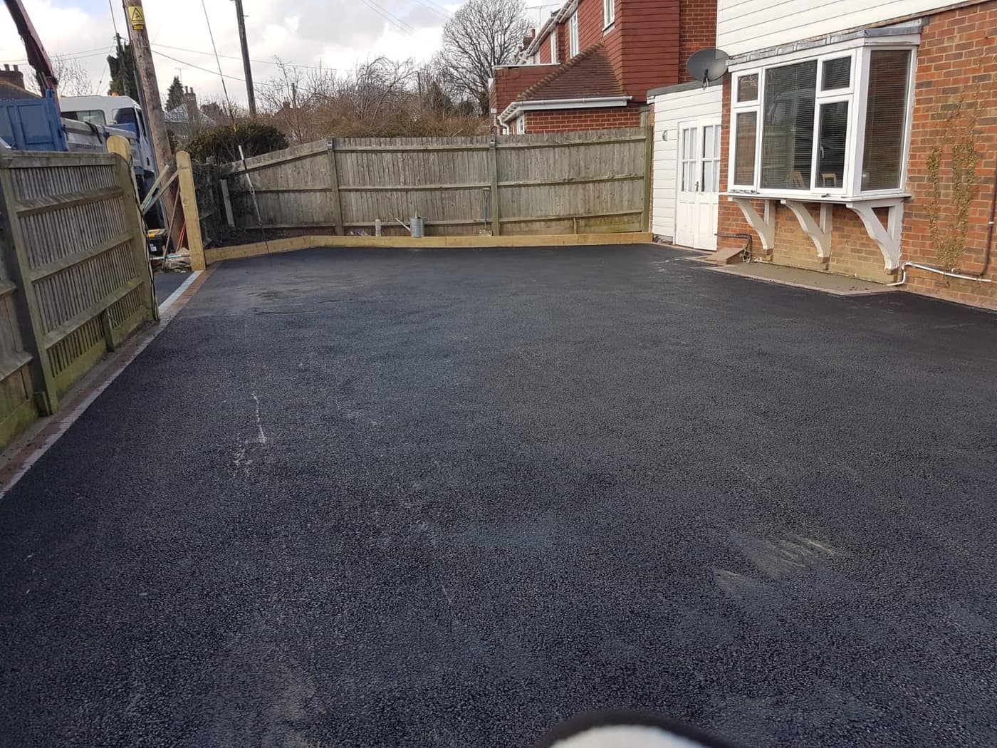 Tarmac driveway with block paving border